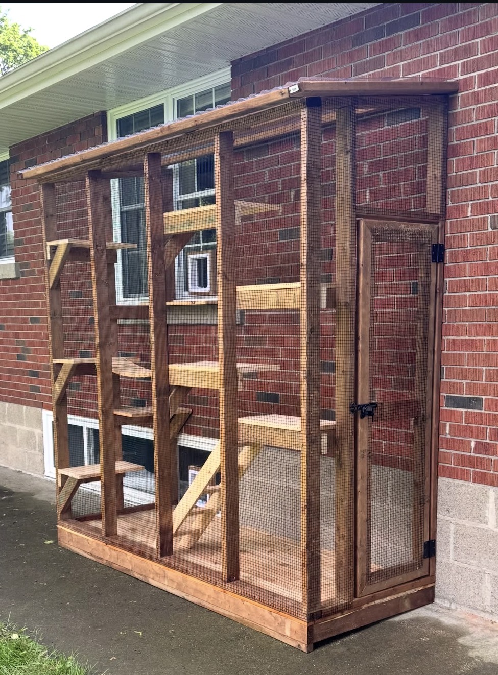 Cedar lean-to catio attached to brick house